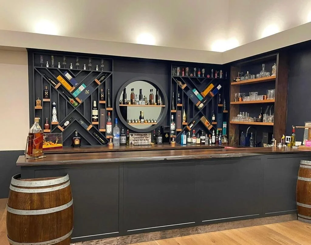 Custom finished basement bar and entertainment space